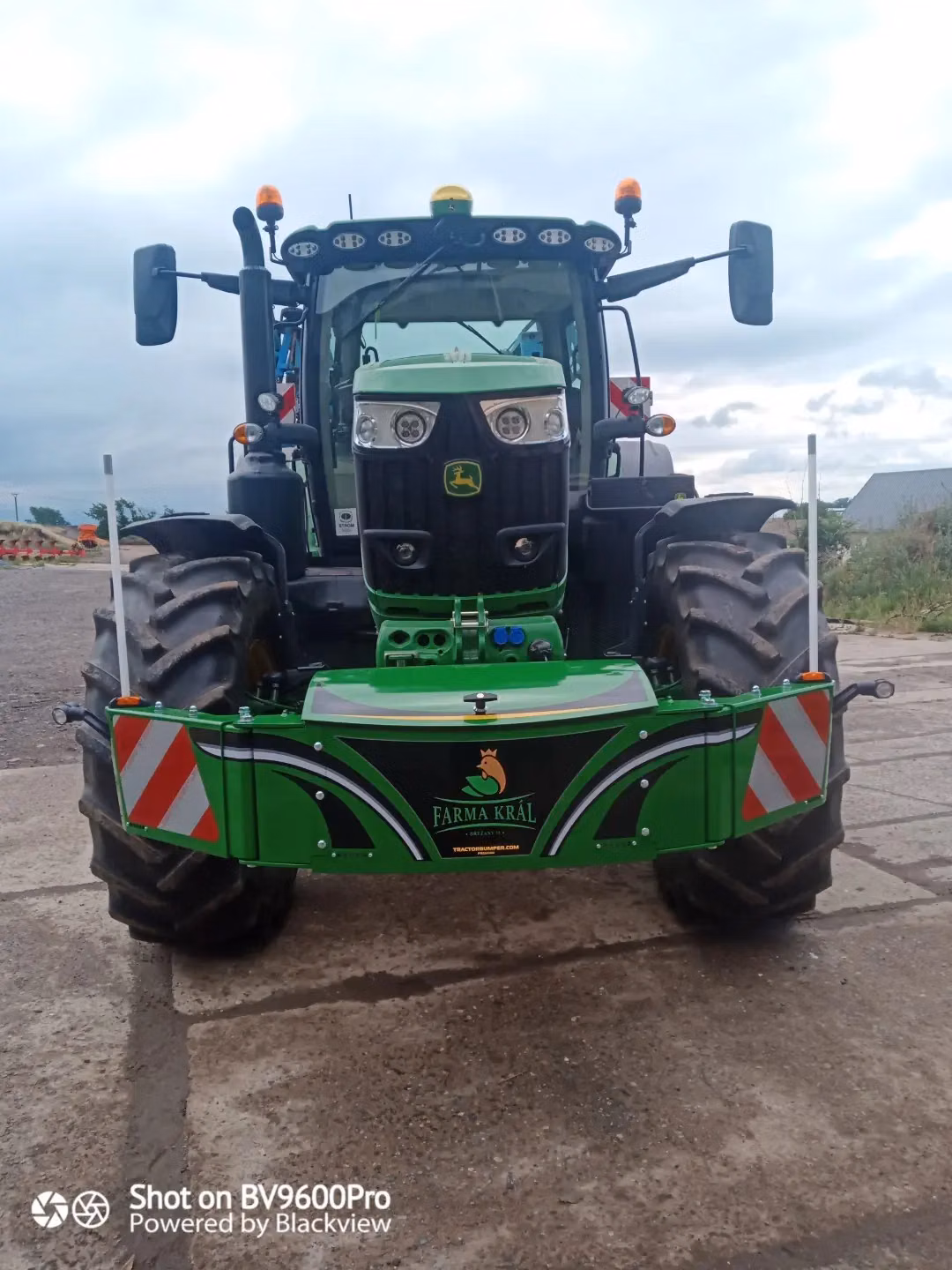John Deere tractor with a TractorBumper front bumper and front weight