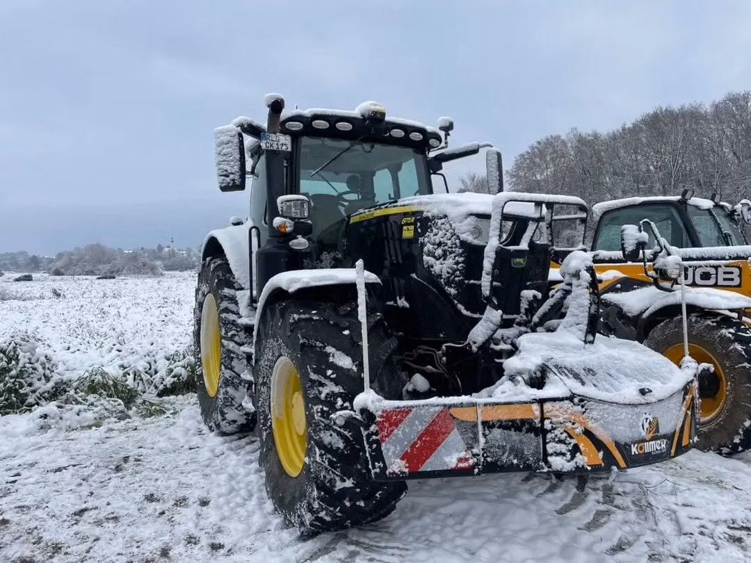 John Deere tractor with a TractorBumper front weight