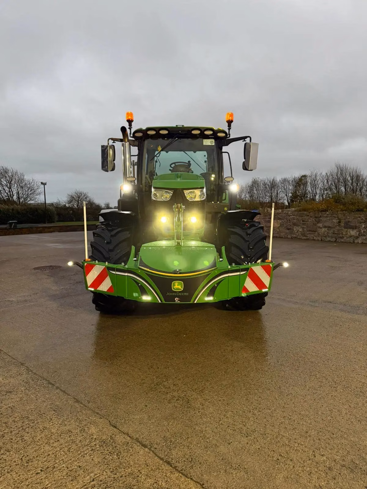 John Deere tractor with a TractorBumper front weight