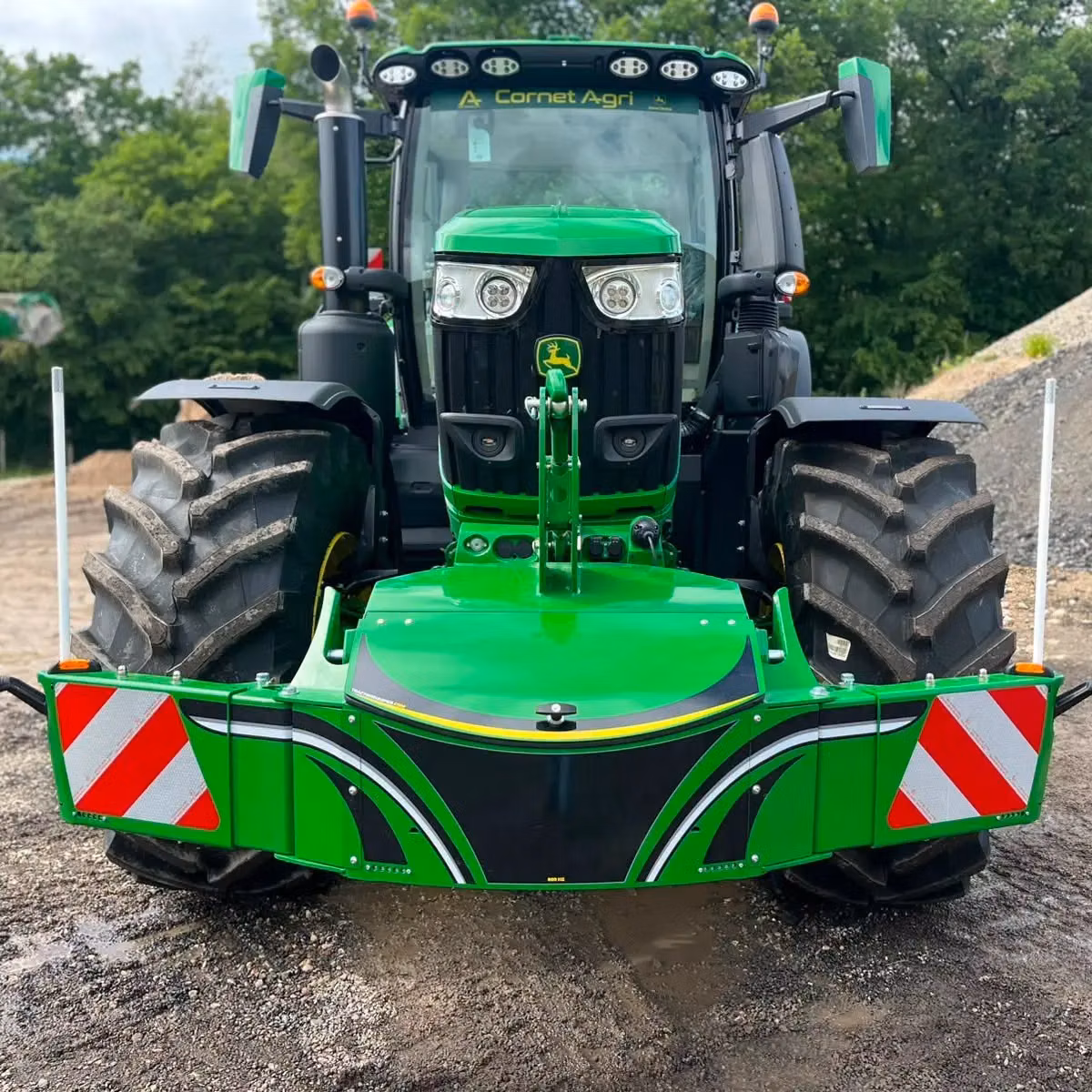 John Deere tractor with a TractorBumper front box and marker boards
