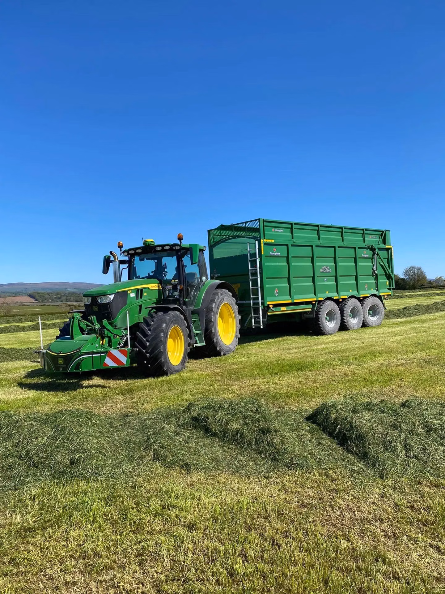 John Deere tractor with a TractorBumper front weight