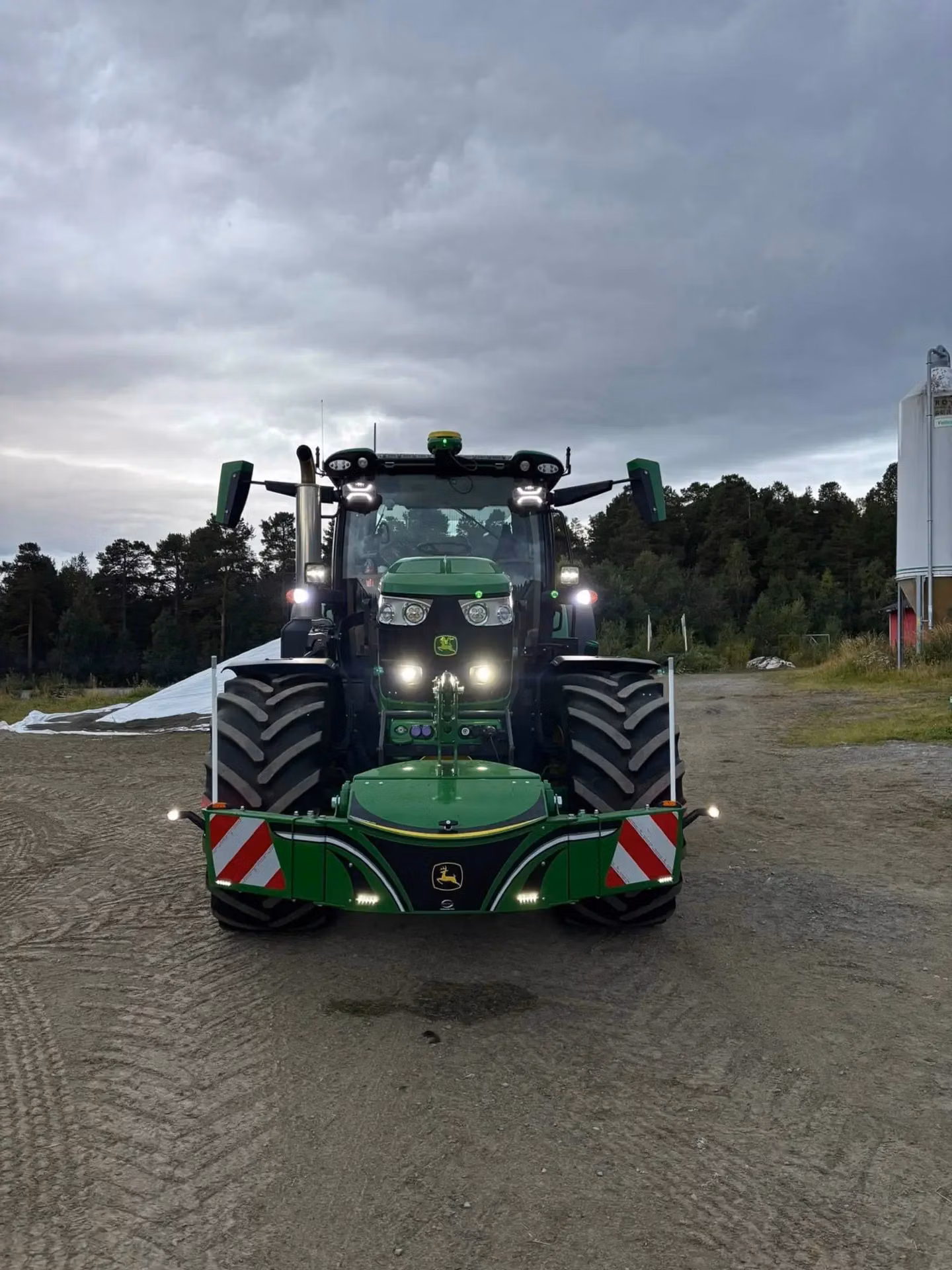 John Deere tractor with a TractorBumper front weight