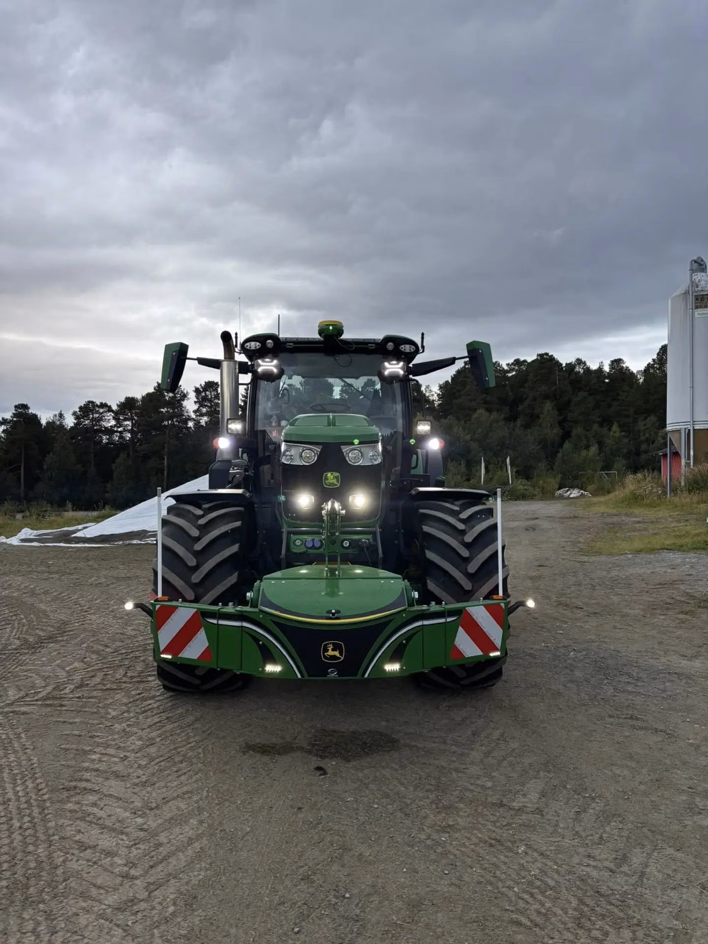 John Deere tractor with a TractorBumper front weight