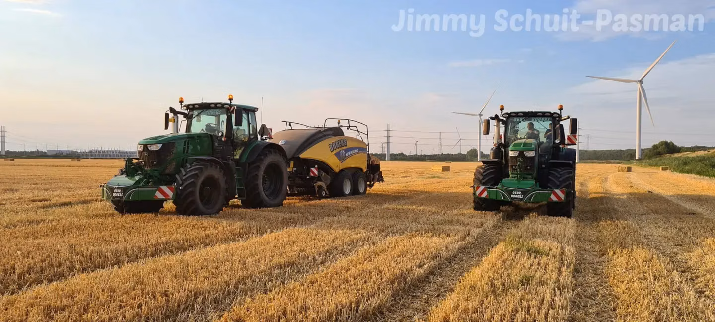John Deere tractor with a TractorBumper front bumper and rear weight