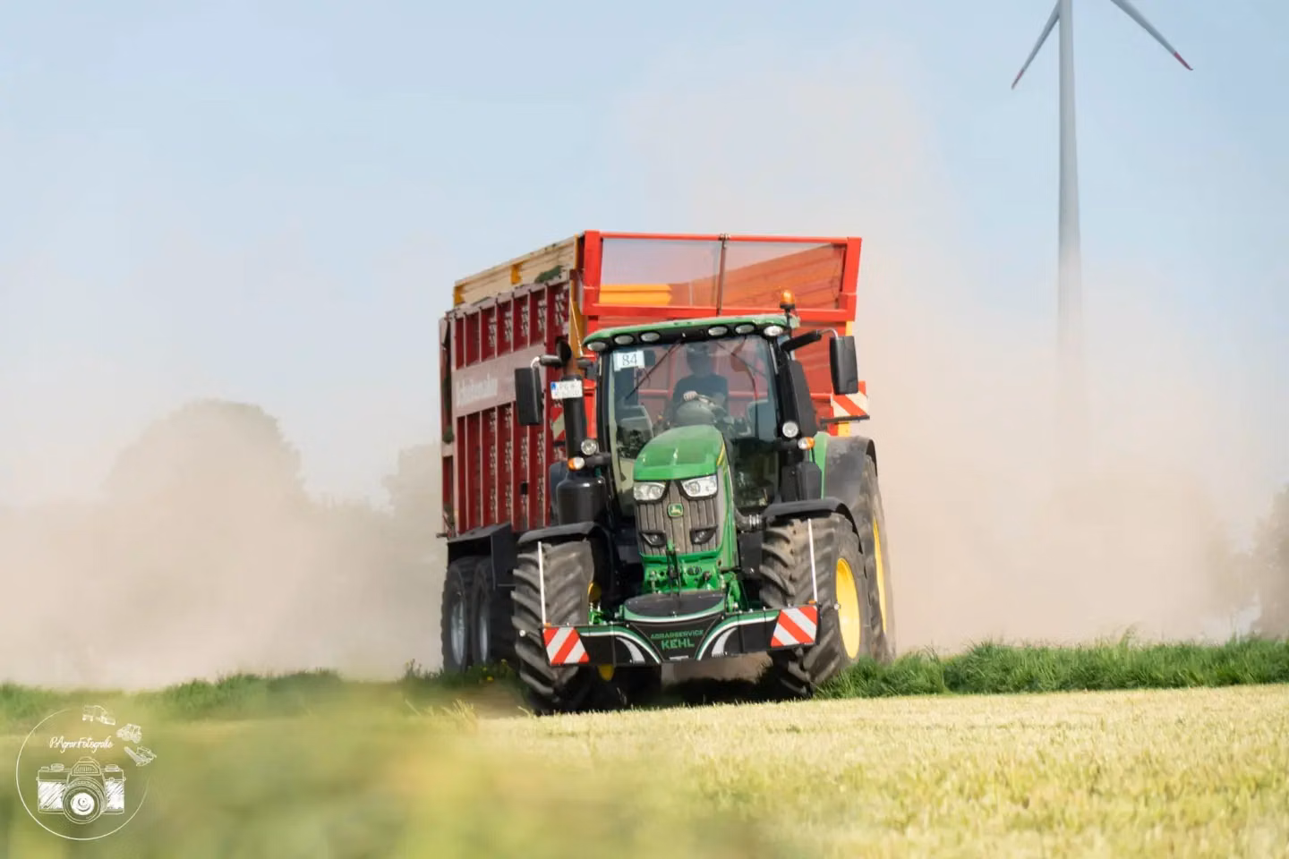 John Deere tractor with a TractorBumper front box and marker boards