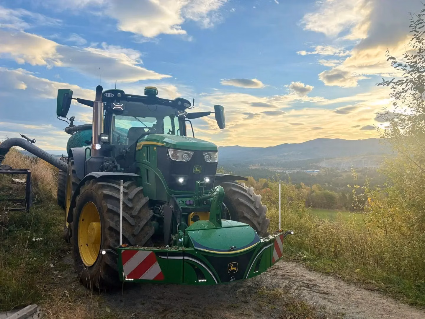 John Deere tractor with a TractorBumper front weight