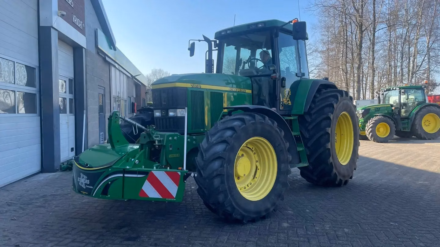 John Deere tractor with a TractorBumper front weight