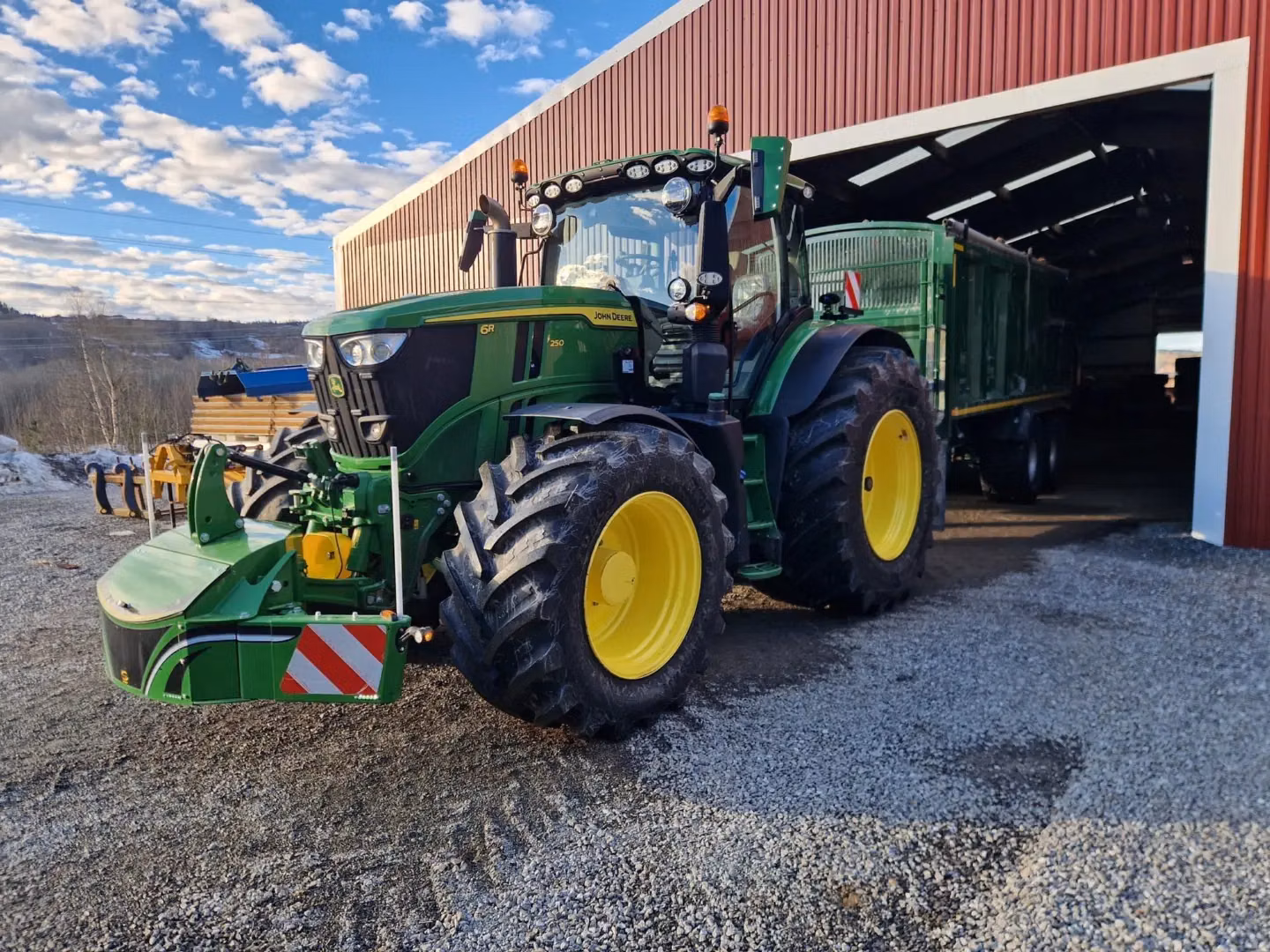 John Deere tractor with a TractorBumper front weight