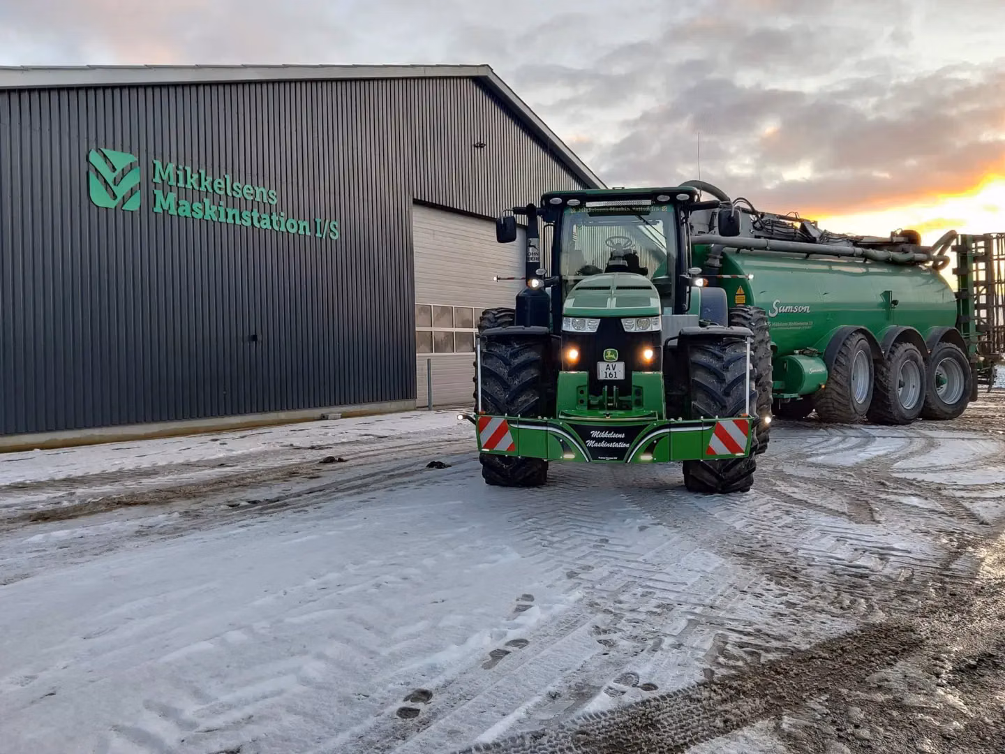 John Deere tractor with a TractorBumper front weight