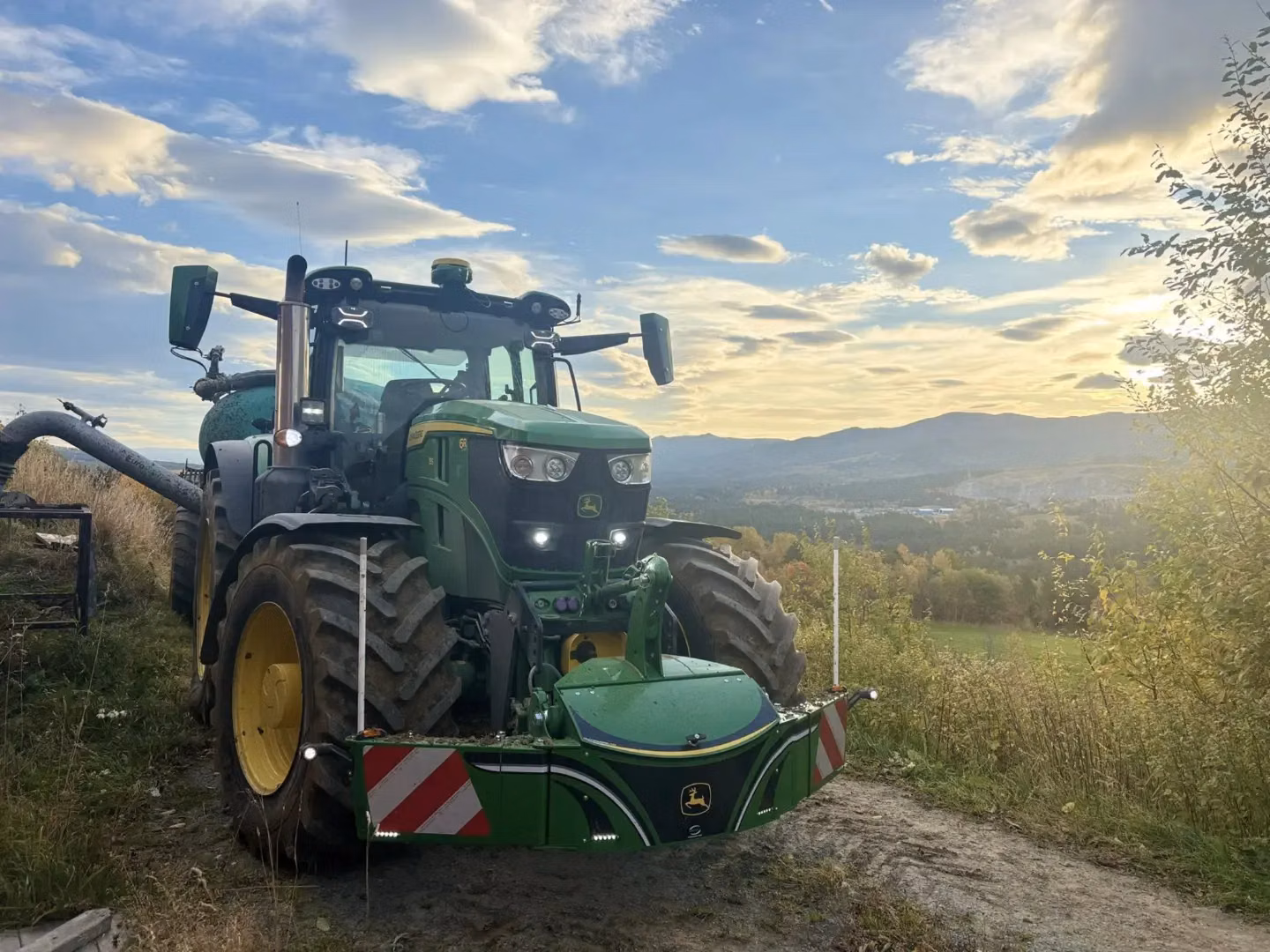 John Deere tractor with a TractorBumper front weight