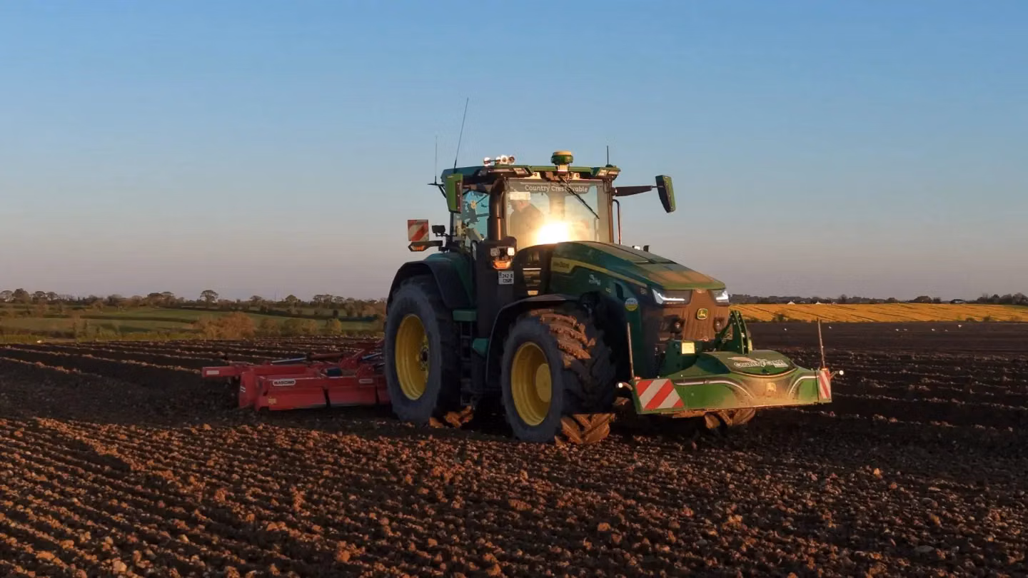 John Deere tractor with a TractorBumper front weight