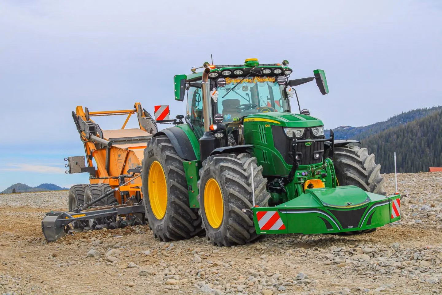 John Deere tractor with a TractorBumper front weight