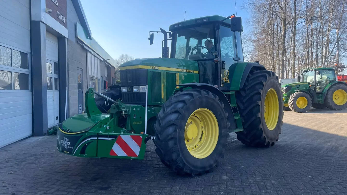 John Deere tractor with a TractorBumper front weight