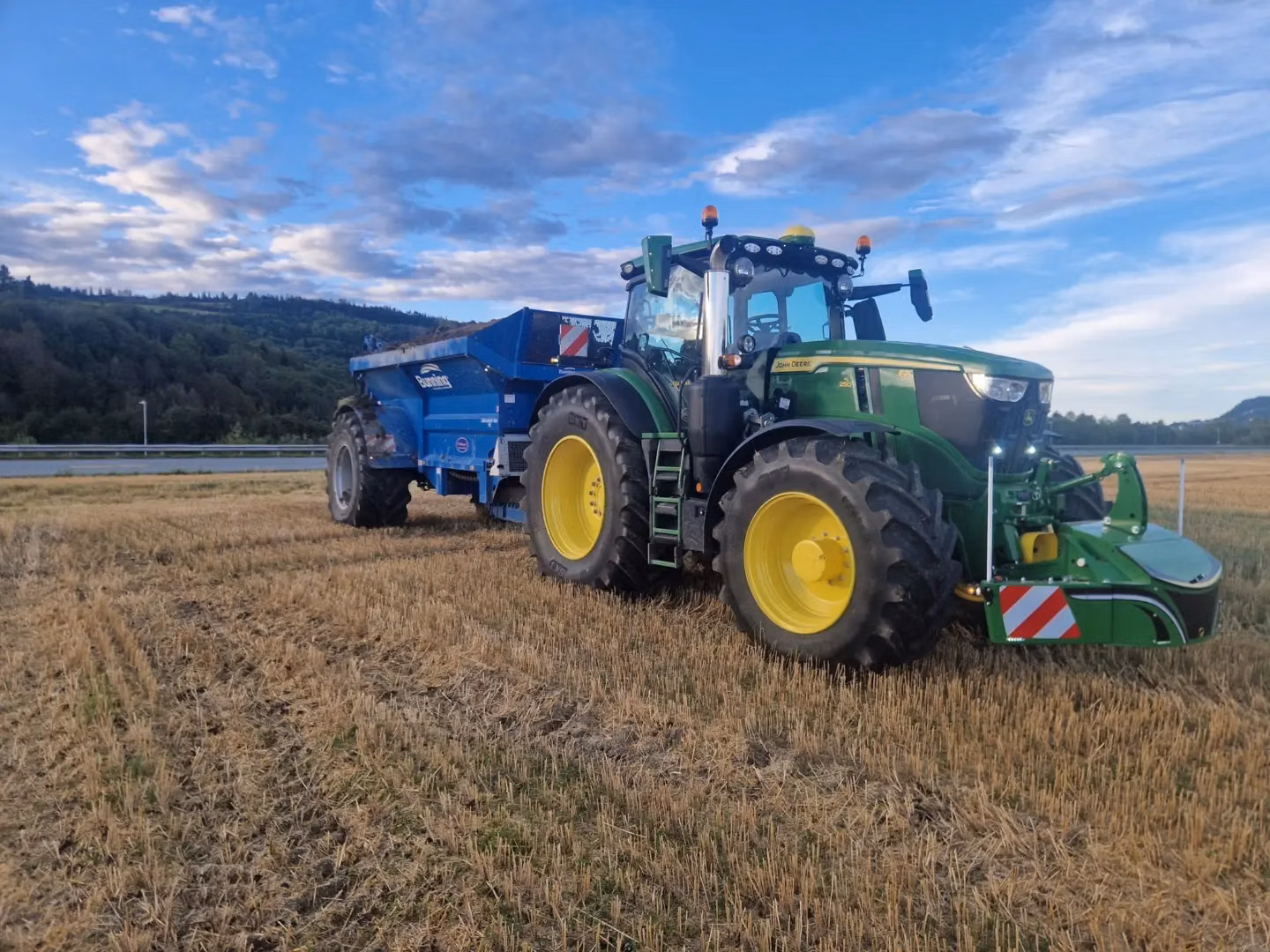 John Deere tractor with a TractorBumper front weight