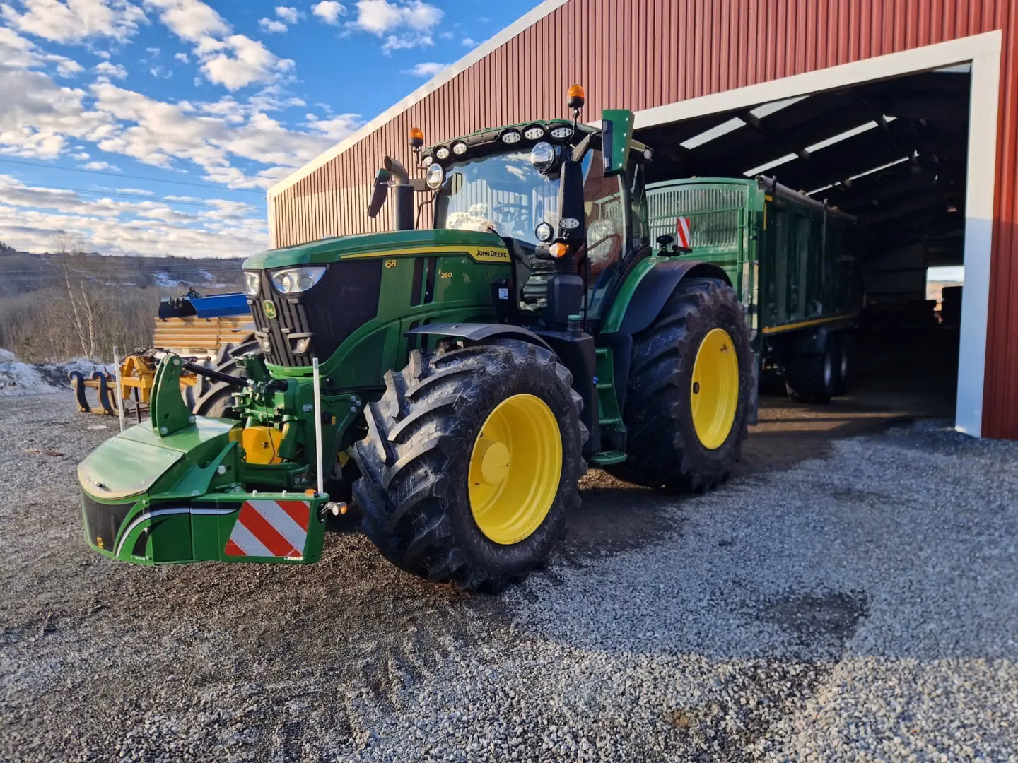 John Deere tractor with a TractorBumper front weight