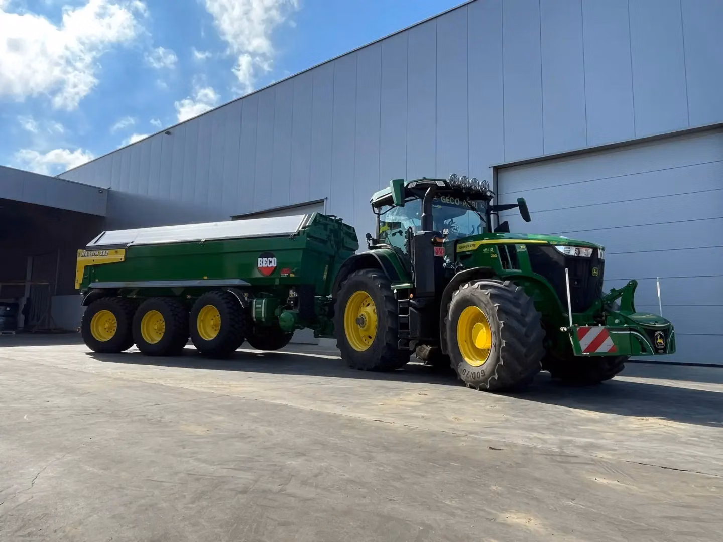 John Deere tractor with a TractorBumper front bumper and rear weight