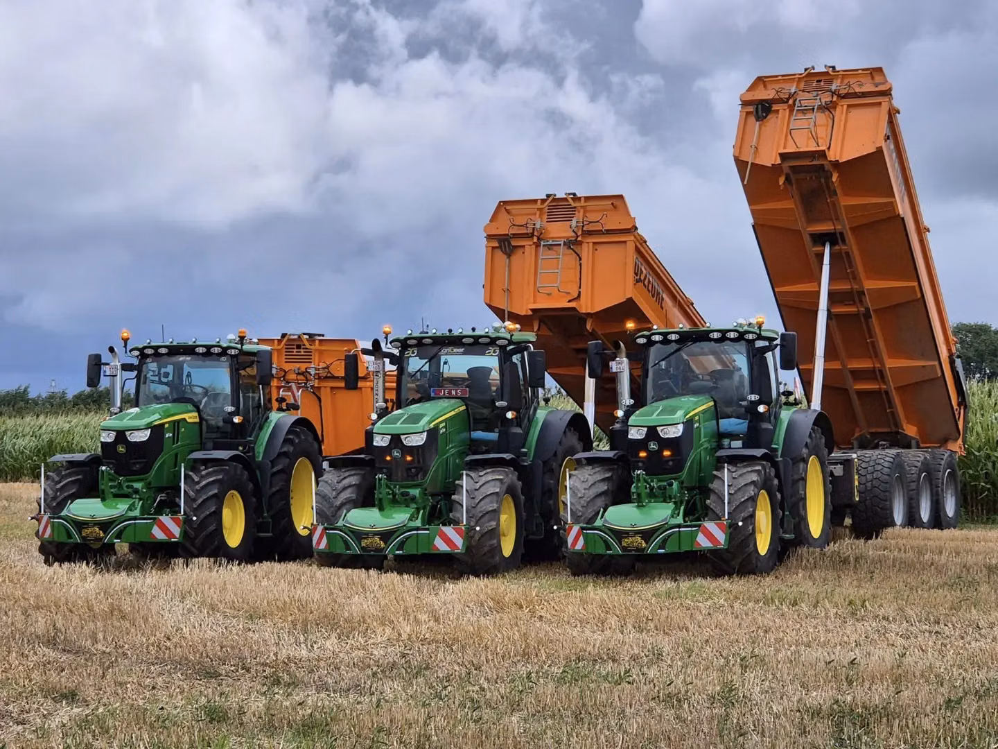 John Deere tractor with a TractorBumper front bumper and rear weight