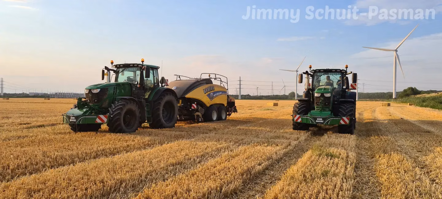 John Deere tractor with a TractorBumper front bumper and rear weight