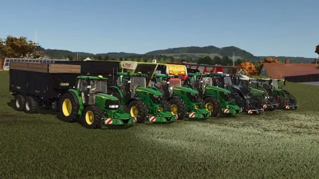 John Deere tractor with a TractorBumper front weight and LED lighting