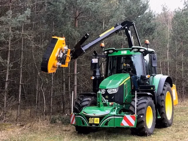 John Deere tractor with a TractorBumper front bumper and front weight