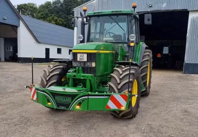 John Deere tractor with a TractorBumper front weight